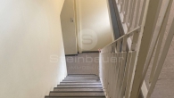 Treppenhaus - 3-Zimmer-Eigentumswohnung in zentraler Lage